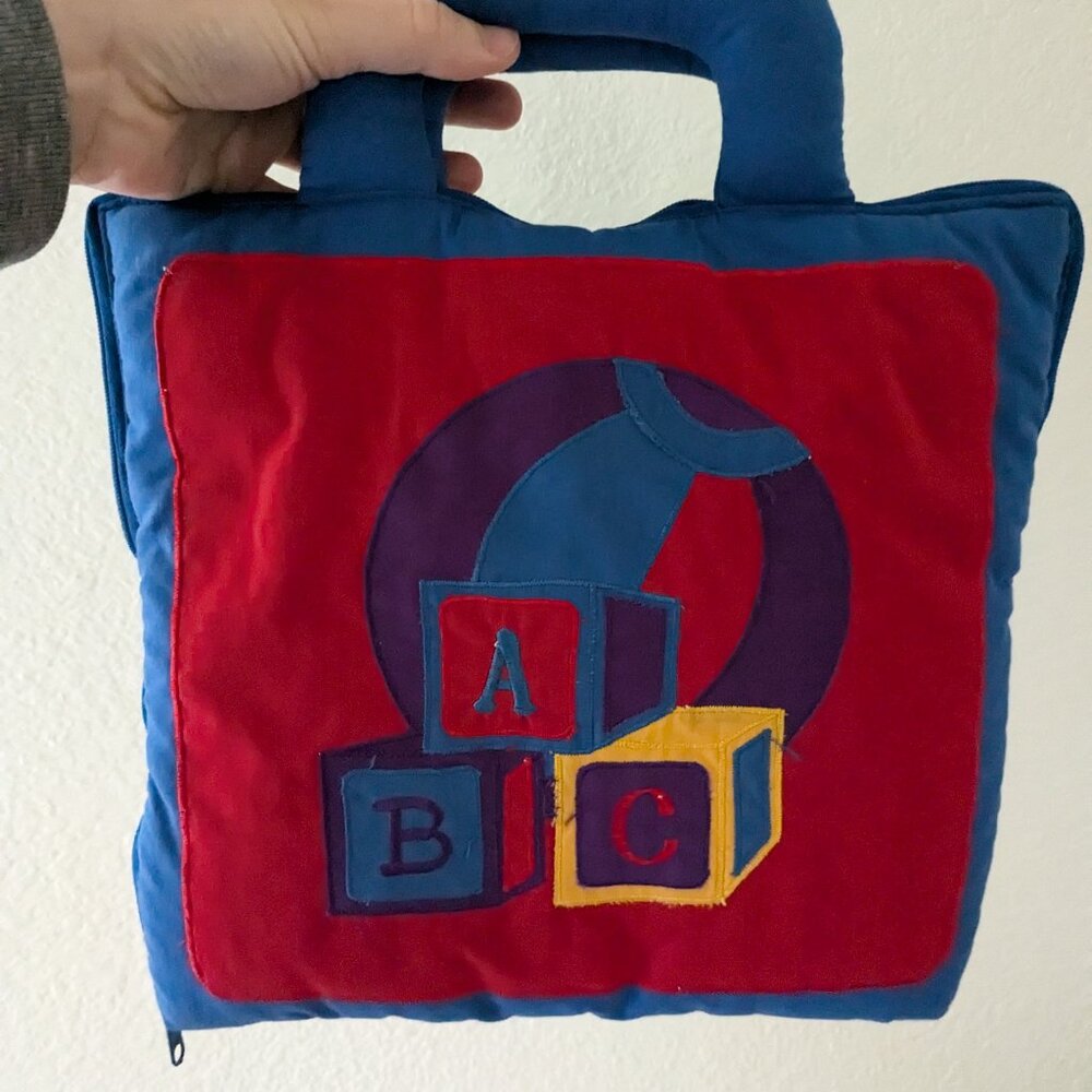 Alphabet cloth activity book by Pockets of Learning / zip cloth handle soft play